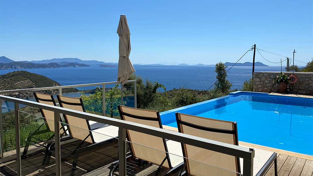 Sunbeds at the swimming pool Sivota Greece Villa Nirvana with Ionian Sea view